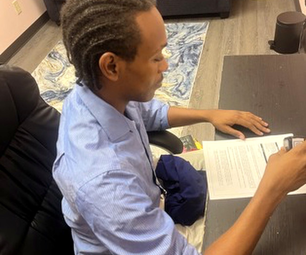 Client reviewing apostille documents in office